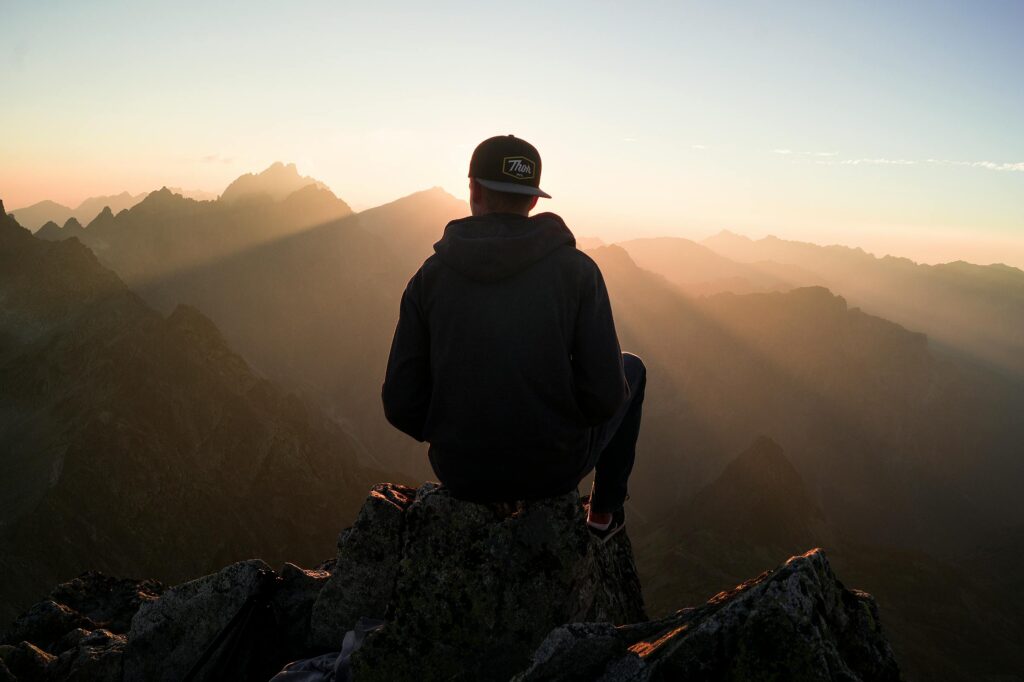 Person-who-is-improving-life-by-staring-at-the-sunset